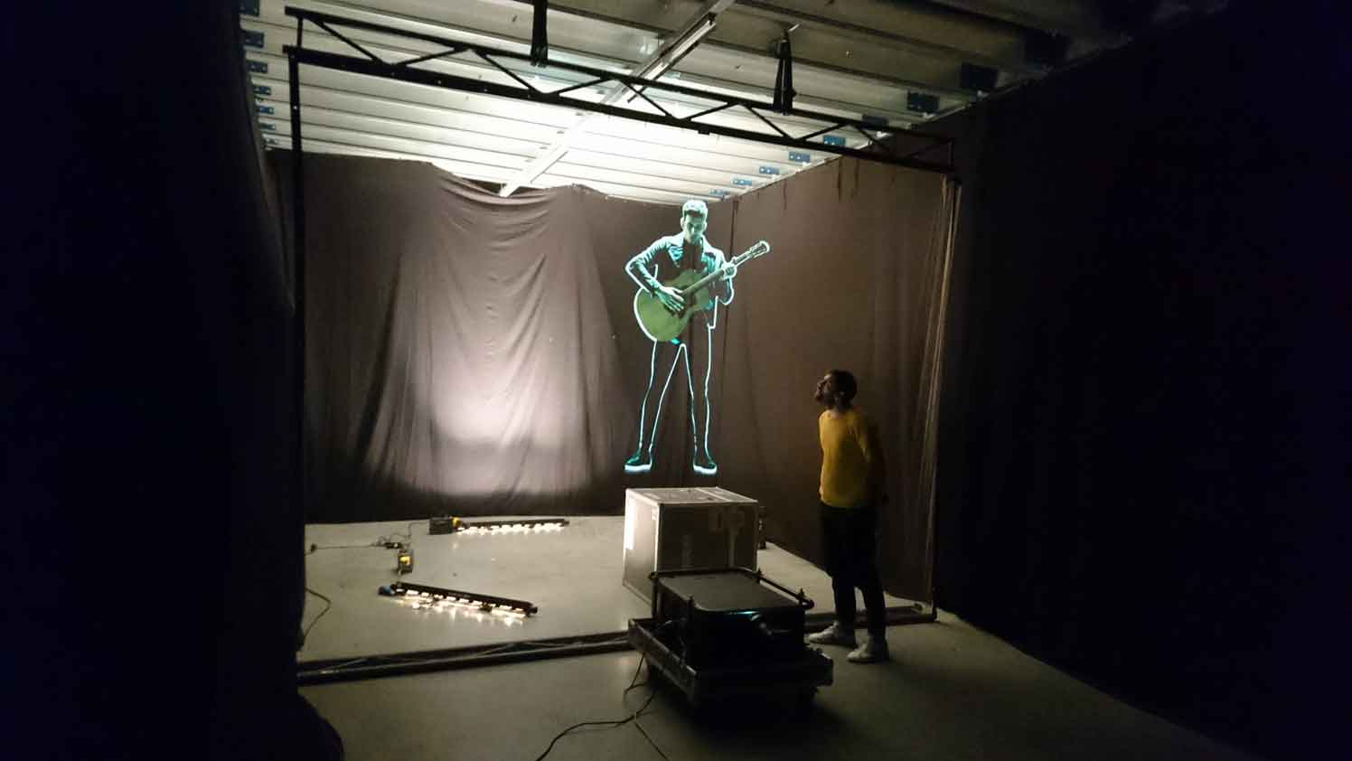 Projected figure on a semi-transparent gauze