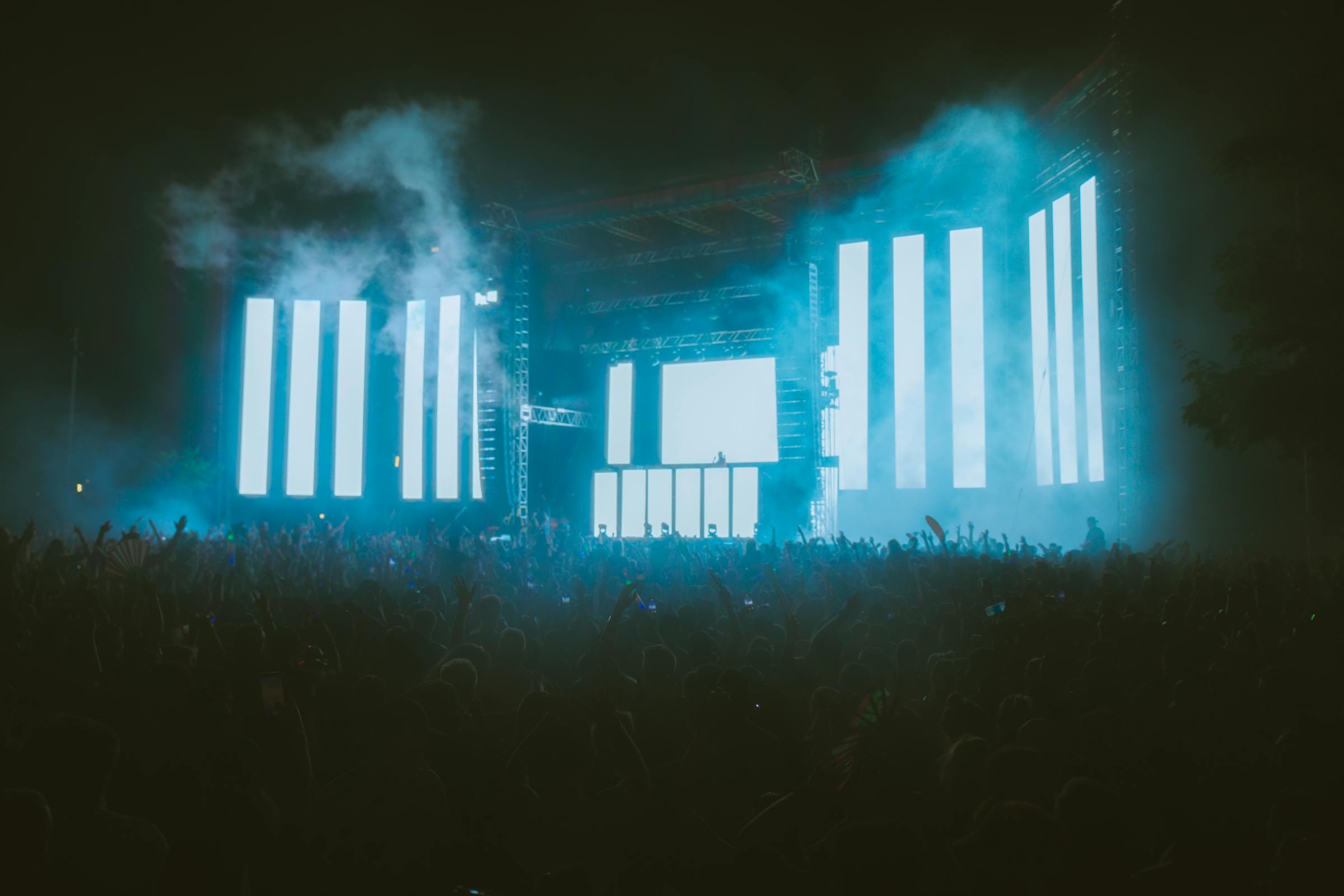 Attendees interacting hands-on with an immersive brand installation at a live event